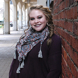 Pictured is creative writing student Mary Moses. | Photo by Sydney Patton